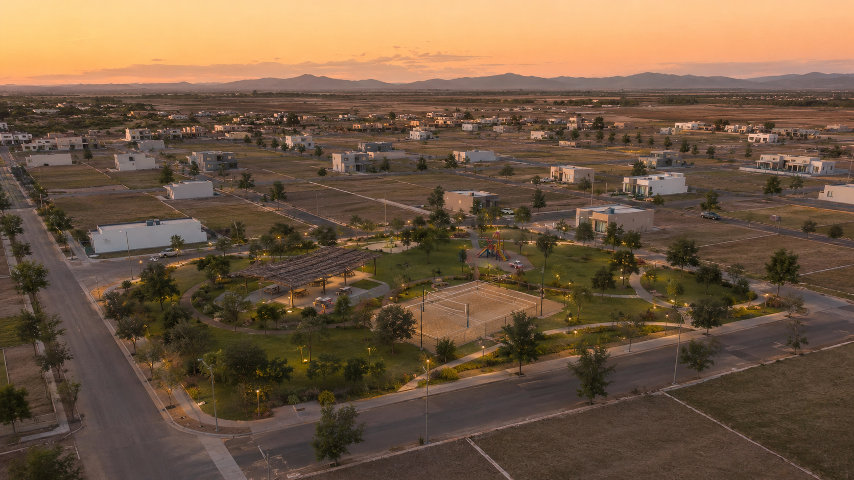 Vista general ilustrativa del desarrollo Cumbres del Valle con áreas verdes y espacios de convivencia familiar en Mexicali